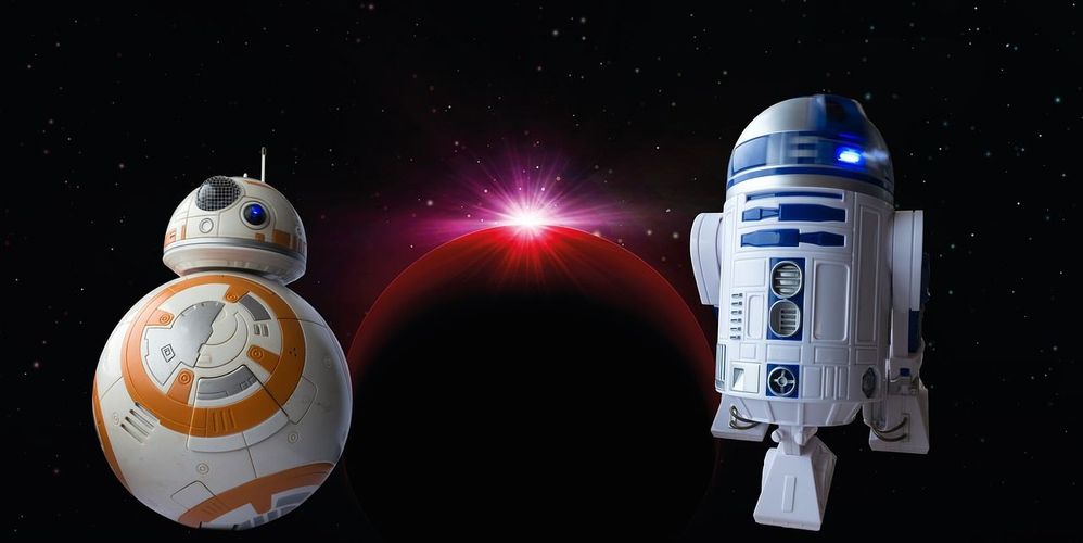 Image depicting robots from the star wars series against an outer space themed background.